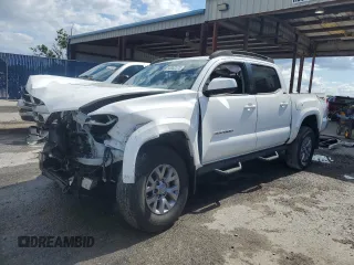 2018 Toyota Tacoma SR5 с VIN 5TFAZ5CN0JX070041, выставлен на аукционе Copart как лот 56902075 с пробегом 57 089 миль миль и Списание • Salvage title. История ставок и продаж доступна на DreamBid. Изображение 1.