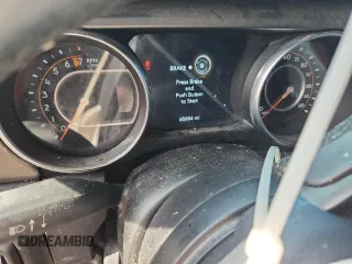 2021 Jeep Gladiator 80th Anniversary с VIN 1C6HJTAG7ML521094, выставлен на аукционе Copart как лот 61276595 с пробегом 68 684 миль миль и Списание • Salvage title. История ставок и продаж доступна на DreamBid. Изображение 9.
