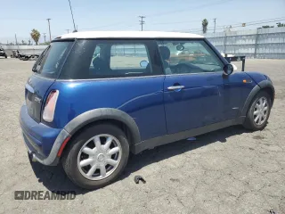 2004 MINI Hardtop z VIN WMWRC334X4TC51451, wystawiony jako Copart lot #61268235 z przebiegiem 149 750 mil mil oraz Szkoda całkowita • Salvage title. Historia ofert i sprzedaży dostępna na DreamBid. Obrazek 3.