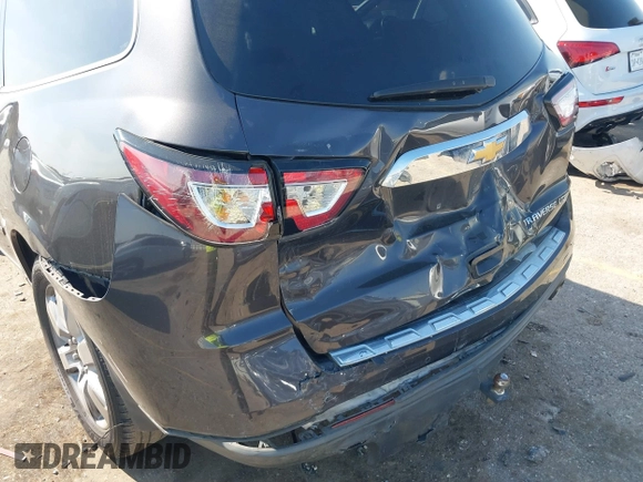 2016 Chevrolet Traverse LTZ z VIN 1GNKRJKD1GJ301277, wystawiony jako IAAI lot #41884629 z przebiegiem 106 338 mil mil oraz . Historia ofert i sprzedaży dostępna na DreamBid. Obrazek 6.