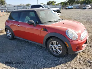 2011 MINI Hardtop with VIN WMWSU3C58BT183765, listed as a Copart auction lot 63061405 with 59,902 mi miles and Salvage title. Bid and sale history available at DreamBid. Image 4.