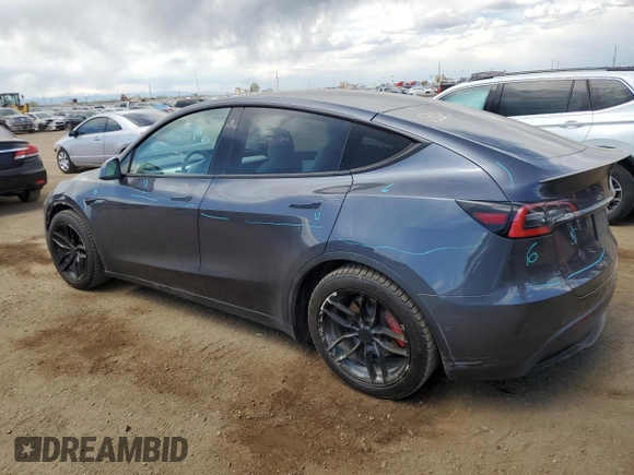 2021 Tesla Model Y Performance with VIN 5YJYGDEF0MF137692, listed as a Copart auction lot 55333395 with 56,325 mi miles and Salvage Title. Bid and sale history available at DreamBid. Image 2.