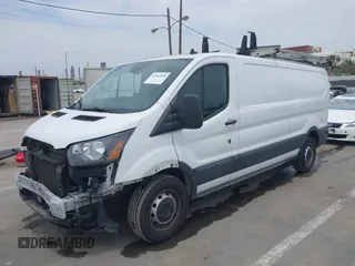 2020 Ford Transit Cargo z VIN 1FTYE1Y86LKA19374, wystawiony jako IAAI lot #42362018 z przebiegiem 93 512 mil mil oraz . Historia ofert i sprzedaży dostępna na DreamBid. Obrazek 18.