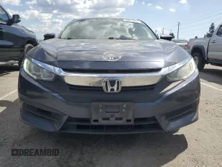 2018 Honda Civic EX с VIN 2HGFC2F72JH600406, выставлен на аукционе Copart как лот 52011455 с пробегом 155 666 миль миль и Списание • Salvage title. История ставок и продаж доступна на DreamBid. Изображение 5.