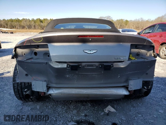 2014 Aston Martin Vantage z VIN SCFEKBBK3EGD18661, wystawiony jako Copart lot #86366204 z przebiegiem 14 863 mil mil oraz Szkoda całkowita • Salvage title. Historia ofert i sprzedaży dostępna na DreamBid. Obrazek 6.