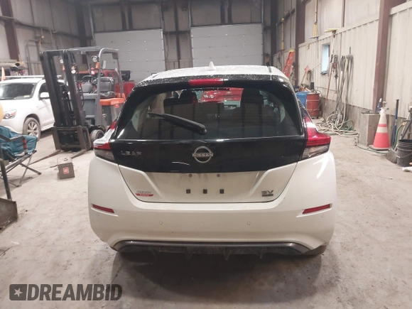 2023 Nissan LEAF SV Plus z VIN 1N4CZ1CV0PC563256, wystawiony jako IAAI lot #41138436 z przebiegiem 24 399 mil mil oraz . Historia ofert i sprzedaży dostępna na DreamBid. Obrazek 16.