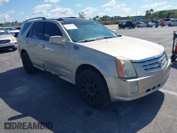 2008 Cadillac SRX AWD with VIN 1GYEE637280101842, listed as a IAAI auction lot 41417596 with 125,052 mi miles. Bid and sale history available at carsss.com. Image 1.