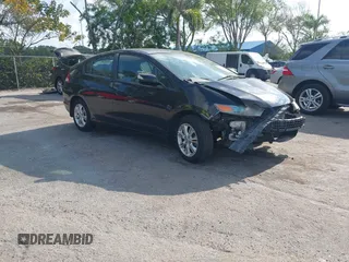 2010 Honda Insight EX with VIN JHMZE2H76AS000837, listed as a IAAI auction lot 42103333 with 146,576 mi miles and . Bid and sale history available at carsss.com. Image 1.