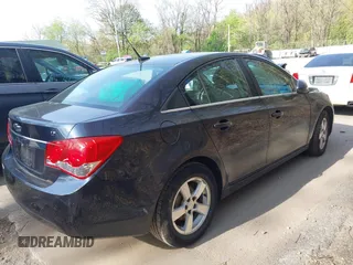 2014 Chevrolet Cruze 1LT with VIN 1G1PC5SB1E7302745, listed as a IAAI auction lot 42142048 with 160,000 mi miles and . Bid and sale history available at DreamBid. Image 4.