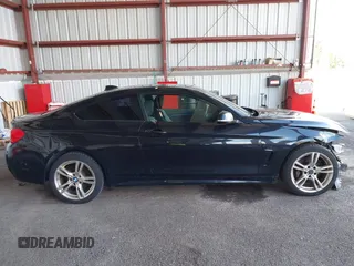 2015 BMW 4 Series 435i xDrive z VIN WBA3R5C54FK371292, wystawiony jako IAAI lot #41802908 z przebiegiem 105 737 mil mil oraz . Historia ofert i sprzedaży dostępna na DreamBid. Obrazek 14.