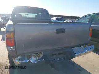 2000 Toyota Tundra SR5 with VIN 5TBRT3413YS019873, listed as a IAAI auction lot 41412497 with 305,472 mi miles and . Bid and sale history available at DreamBid. Image 16.
