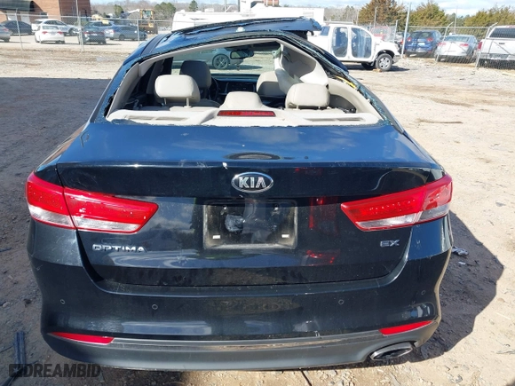 2017 Kia Optima EX with VIN 5XXGU4L33HG135421, listed as a IAAI auction lot 41738011 with 128,594 mi miles. Bid and sale history available at carsss.com. Image 16.