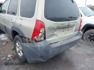 2005 Mazda Tribute i with VIN 4F2YZ02Z35KM57658, listed as a IAAI auction lot 41547562 with 131,303 mi miles and . Bid and sale history available at carsss.com. Image 6.