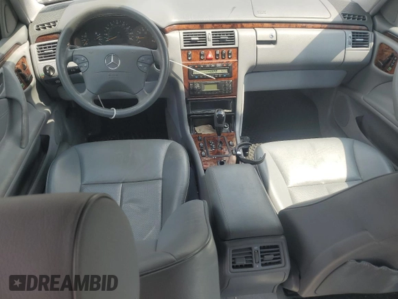 2001 Mercedes-Benz E-Class with VIN WDBJH65J41B201471, listed as a Copart auction lot 68863194 with 106,893 mi miles and Salvage Title. Bid and sale history available at carsss.com. Image 8.