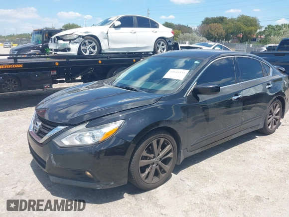 2018 Nissan Altima SV with VIN 1N4AL3AP8JC259494, listed as a IAAI auction lot 42041433 with 150,970 mi miles and . Bid and sale history available at DreamBid. Image 18.