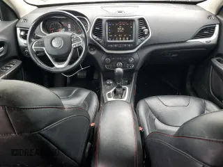 2015 Jeep Cherokee Trailhawk с VIN 1C4PJMBSXFW555223, выставлен на аукционе Copart как лот 62072235 с пробегом 207 240 миль миль и На запчасти • Non repairable. История ставок и продаж доступна на DreamBid. Изображение 8.