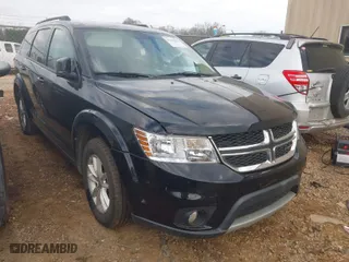 2015 Dodge Journey SXT with VIN 3C4PDCBGXFT628173, listed as a IAAI auction lot 41500091 with 105,826 mi miles. Bid and sale history available at carsss.com. Image 1.