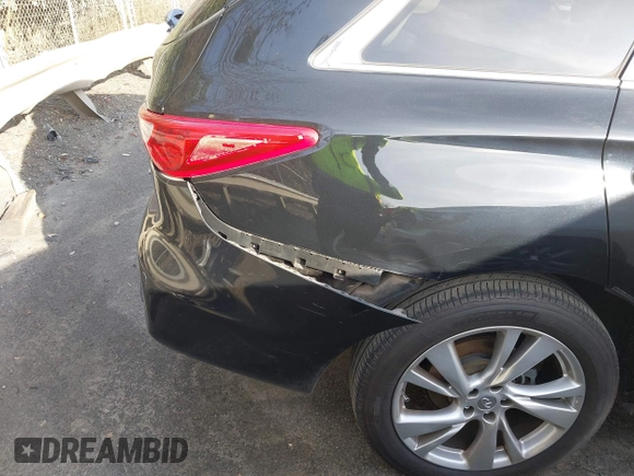 2013 Infiniti JX35 with VIN 5N1AL0MN8DC300855, listed as a IAAI auction lot 41599520 with 151,756 mi miles. Bid and sale history available at carsss.com. Image 6.