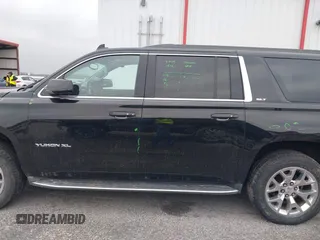 2015 GMC Yukon XL SLT with VIN 1GKS2HKC6FR746809, listed as a IAAI auction lot 41559570 with 144,401 mi miles. Bid and sale history available at carsss.com. Image 15.