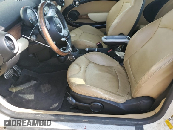 2009 MINI Hardtop S with VIN WMWMF73529TW81190, listed as a Copart auction lot 54172195 with 83,841 mi miles and Salvage Title. Bid and sale history available at DreamBid. Image 7.