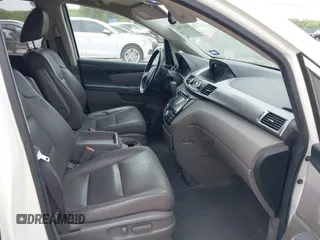 2015 Honda Odyssey EX-L with VIN 5FNRL5H68FB056282, listed as a IAAI auction lot 42177732 with 194,244 mi miles and . Bid and sale history available at DreamBid. Image 5.