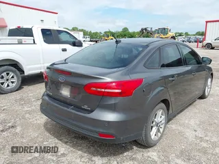 2016 Ford Focus SE with VIN 1FADP3F20GL202777, listed as a IAAI auction lot 42077501 with 116,351 mi miles and . Bid and sale history available at DreamBid. Image 4.