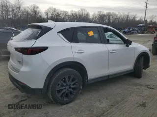 2024 Mazda CX-5 2.5 Carbon Turbo with VIN JM3KFBAY7R0405607, listed as a Copart auction lot 42331165 with 9,207 mi miles and Salvage Title. Bid and sale history available at carsss.com. Image 3.