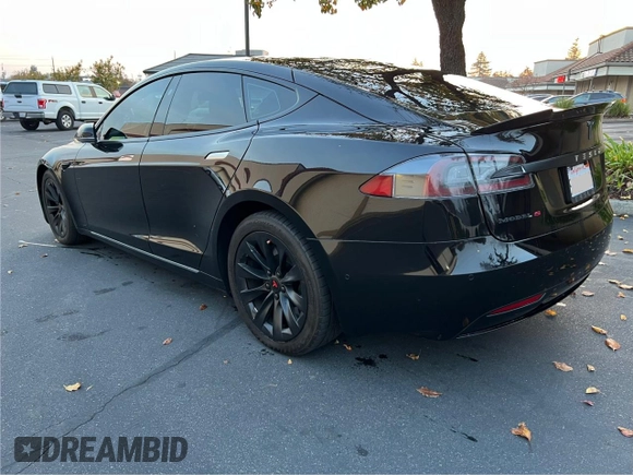 2017 Tesla Model S 60 with VIN 5YJSA1E15HF219286, listed as a Copart auction lot 84771024 with 43,259 mi miles and Salvage title. Bid and sale history available at DreamBid. Image 3.
