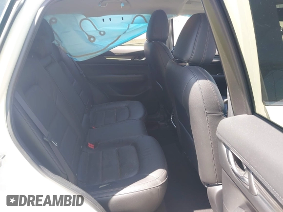 2020 Mazda CX-5 Grand Touring with VIN JM3KFADM9L0821930, listed as a IAAI auction lot 42549986 with 29,929 mi miles and . Bid and sale history available at DreamBid. Image 8.