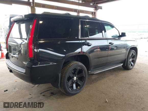 2015 Chevrolet Tahoe LT with VIN 1GNSKBKCXFR604401, listed as a IAAI auction lot 42048559 with 60,768 mi miles and . Bid and sale history available at DreamBid. Image 4.
