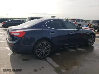 2015 Maserati Ghibli with VIN ZAM57XSA6F1146076, listed as a Copart auction lot 52474303 with 82,575 mi miles. Bid and sale history available at carsss.com. Image 3.