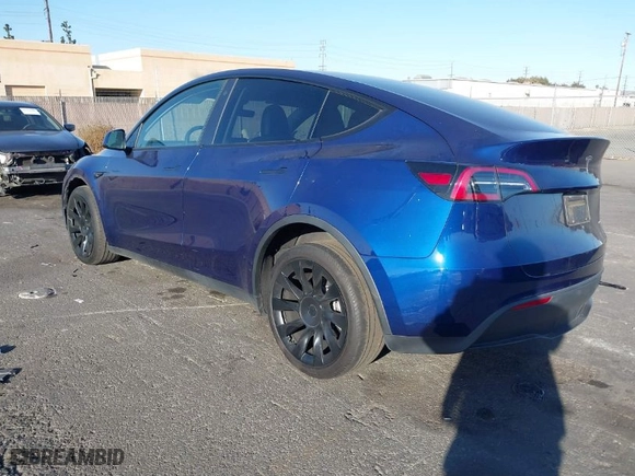 2023 Tesla Model Y Long Range with VIN 7SAYGDEE4PA035856, listed as a IAAI auction lot 41408305 with 59,344 mi miles. Bid and sale history available at carsss.com. Image 3.