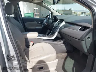 2013 Ford Edge SEL with VIN 2FMDK4JC2DBE33878, listed as a IAAI auction lot 41597848 with 216,761 mi miles. Bid and sale history available at carsss.com. Image 5.
