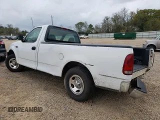 2001 Ford F-150 XL with VIN 3FTZF17201MA44310, listed as a Copart auction lot 73794104 with Not provided miles and Salvage title. Bid and sale history available at DreamBid. Image 2.