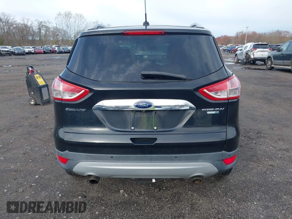 2014 Ford Escape Titanium with VIN 1FMCU9J98EUD73818, listed as a IAAI auction lot 42036442 with 129,794 mi miles. Bid and sale history available at carsss.com. Image 16.