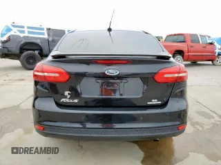 2015 Ford Focus SE z VIN 1FADP3F29FL357021, wystawiony jako Copart lot #57985125 z przebiegiem 142 786 mil mil oraz Szkoda całkowita • Salvage title. Historia ofert i sprzedaży dostępna na DreamBid. Obrazek 6.