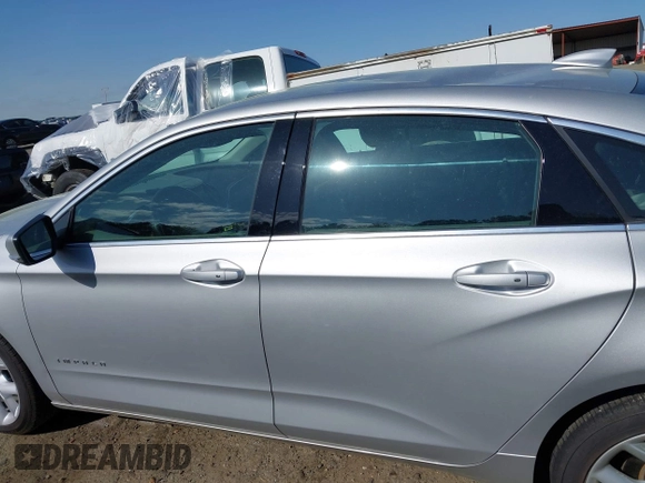 2015 Chevrolet Impala LT with VIN 2G1125S35F9213472, listed as a IAAI auction lot 41924702 with 124,656 mi miles and . Bid and sale history available at DreamBid. Image 14.