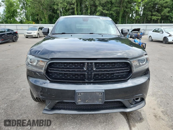 2014 Dodge Durango R/T z VIN 1C4SDJCT4EC318556, wystawiony jako Copart lot #60149025 z przebiegiem 184 114 mil mil oraz Szkoda całkowita • Salvage title. Historia ofert i sprzedaży dostępna na DreamBid. Obrazek 5.