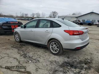 2015 Ford Focus SE with VIN 1FADP3F29FL370335, listed as a Copart auction lot 51010975 with 215,026 mi miles and Clean Title. Bid and sale history available at DreamBid. Image 2.