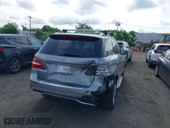 2014 Mercedes-Benz M 350 with VIN 4JGDA5HBXEA369737, listed as a IAAI auction lot 42718890 with 114,740 mi miles and . Bid and sale history available at DreamBid. Image 6.