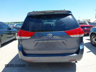 2014 Toyota Sienna XLE with VIN 5TDYK3DC5ES481399, listed as a IAAI auction lot 42085550 with 154,157 mi miles. Bid and sale history available at carsss.com. Image 16.