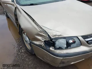2004 Chevrolet Impala with VIN 2G1WF52E449148302, listed as a IAAI auction lot 42017347 with 233,618 mi miles. Bid and sale history available at carsss.com. Image 6.