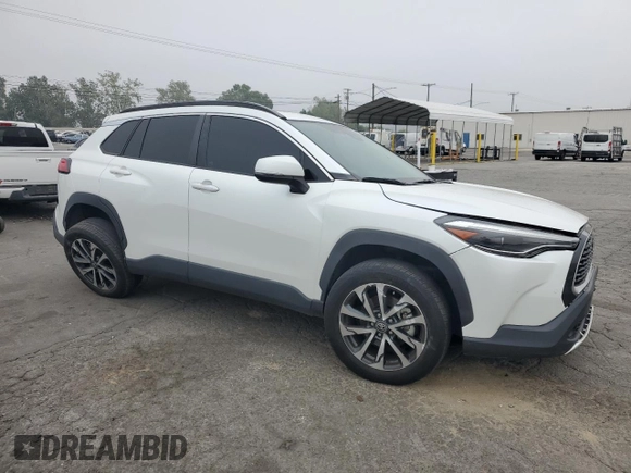 2022 Toyota Corolla Cross XLE with VIN 7MUDAAAG6NV014706, listed as a Copart auction lot 52456065 with 31,041 mi miles and Salvage title. Bid and sale history available at DreamBid. Image 4.