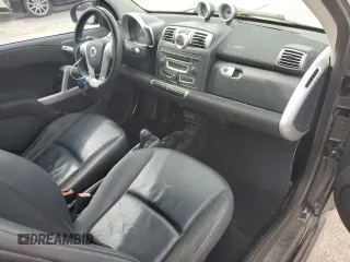 2009 Smart fortwo Pure z VIN WMEEJ31XX9K269982, wystawiony jako Copart lot #59214215 z przebiegiem 99 711 mil mil oraz Tytuł czysty. Historia ofert i sprzedaży dostępna na DreamBid. Obrazek 8.