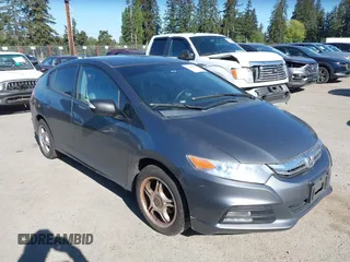2012 Honda Insight EX z VIN JHMZE2H70CS003655, wystawiony jako IAAI lot #42192815 z przebiegiem 125 899 mil mil oraz . Historia ofert i sprzedaży dostępna na DreamBid. Obrazek 1.