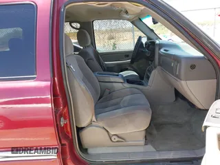 2004 GMC Yukon SLT with VIN 1GKEK13Z44R301456, listed as a IAAI auction lot 42056635 with 196,799 mi miles. Bid and sale history available at carsss.com. Image 5.