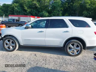 2013 Dodge Durango Citadel with VIN 1C4SDJET6DC652552, listed as a IAAI auction lot 42602746 with 163,602 mi miles and . Bid and sale history available at DreamBid. Image 14.