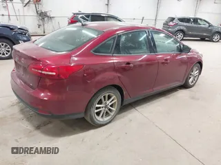2015 Ford Focus SE with VIN 1FADP3F21FL270827, listed as a IAAI auction lot 42665015 with 162,745 mi miles and . Bid and sale history available at DreamBid. Image 4.