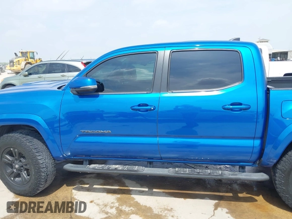 2018 Toyota Tacoma SR5 z VIN 5TFAZ5CN2JX064452, wystawiony jako IAAI lot #41945468 z przebiegiem 132 450 mil mil oraz . Historia ofert i sprzedaży dostępna na DreamBid. Obrazek 14.