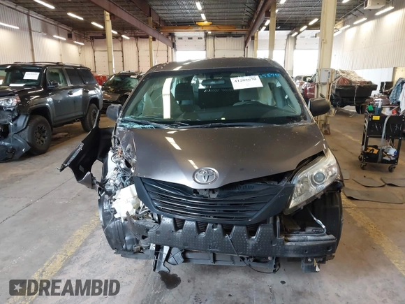 2015 Toyota Sienna L with VIN 5TDZK3DCXFS567507, listed as a IAAI auction lot 41205670 with 104,443 mi miles and . Bid and sale history available at DreamBid. Image 13.